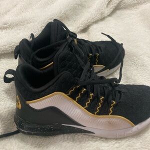 Black and Gold Shaq basketball shoes